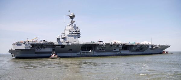 Pre-Commissioning Unit Gerald R. Ford (CVN 78) is maneuvered by tug boats in the James River during the aircraft carrier's turn ship evolution in Newport News, Virginia, U.S. June 11, 2016. Pre-Commissioning Unit Gerald R. Ford (CVN 78) is maneuvered by tug boats in the James River during the aircraft carrier's turn ship evolution in Newport News, Virginia, U.S. June 11, 2016. - Sputnik Молдова