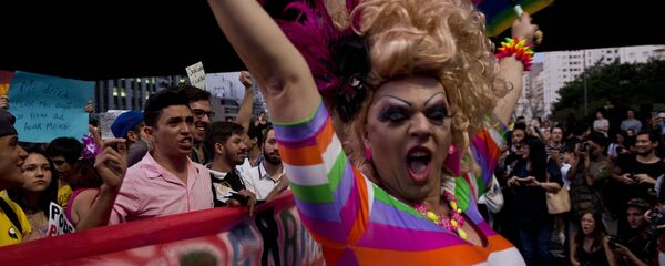 Sympathizers of the LGBT (Lesbian, Gay, Bisexual, Transvestite and Transsexual) community take part in a protest at Paulista Avenue in Sao Paulo, Brazil on September 30, 2014 - Sputnik Moldova-România
