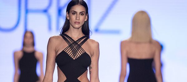 În cea de a doua parte a demonstrației, mai clasică, a fost prezentată colecția Gottex a acestui sezon. - Sputnik Moldova-România