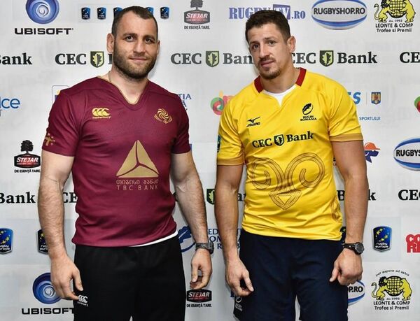 Вице-капитан сборной Грузии по регби Георгий Немсадзе и капитан сборной Румынии Михай Маковей Вице-капитан сборной Грузии по регби Георгий Немсадзе и капитан сборной Румынии Михай Маковей - Sputnik Молдова