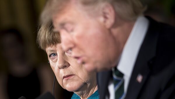 Bundeskanzlerin Angela Merkel und US-Präsident Donals Trump bei der gemeinsamen Pressekonferenz in Washington - Sputnik Молдова
