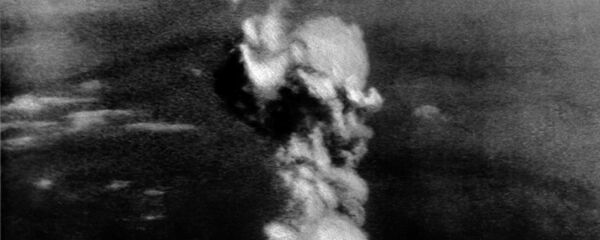 Взрыв атомной бомбы над Хиросимой Взрыв атомной бомбы над Хиросимой - Sputnik Moldova