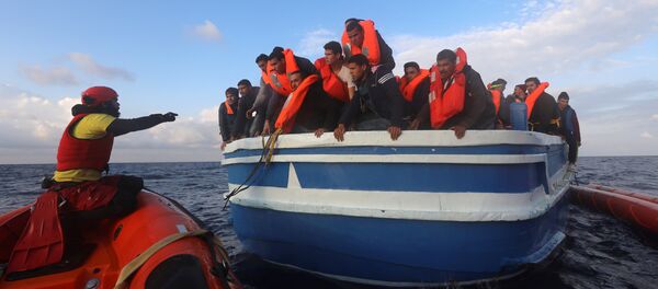 Мигранты. Архивное фото - Sputnik Молдова