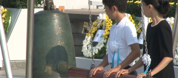 Минута молчания, колокол и свечи: как в мире почтили память жертв Хиросимы - Sputnik Молдова