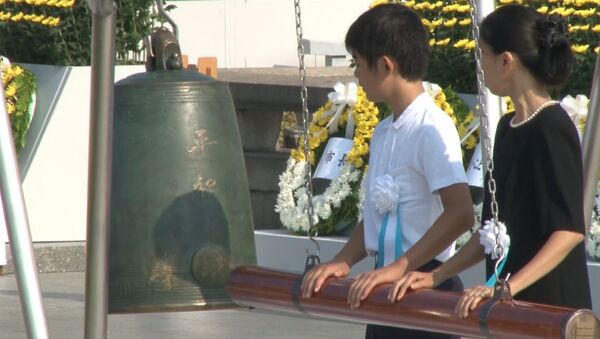 Минута молчания, колокол и свечи: как в мире почтили память жертв Хиросимы - Sputnik Молдова