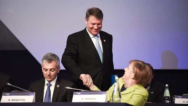 Klaus Iohannis și Angela Merkel la Congresul PPE din Malta - Sputnik Moldova-România