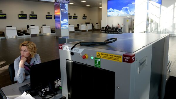 Система сканирования ручного багажа в зале аэропорта - Sputnik Молдова