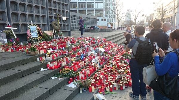 Площадь в Берлине, где на рождественской ярмарке грузовик врезался в толпу Площадь в Берлине, где на рождественской ярмарке грузовик врезался в толпу - Sputnik Молдова