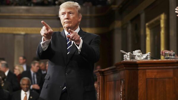 U.S. President Donald Trump reacts after delivering his first address to a joint session of Congress from the floor of the House of Representatives iin Washington, U.S., February 28, 2017 - Sputnik Moldova-România