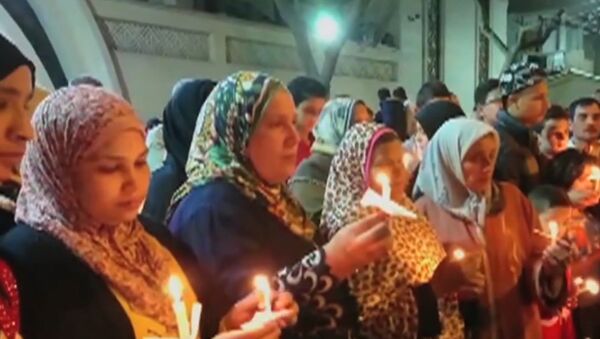 В Египте зажгли свечи в память о жертвах терактов - Sputnik Молдова
