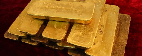 Слитки золота - Sputnik Moldova