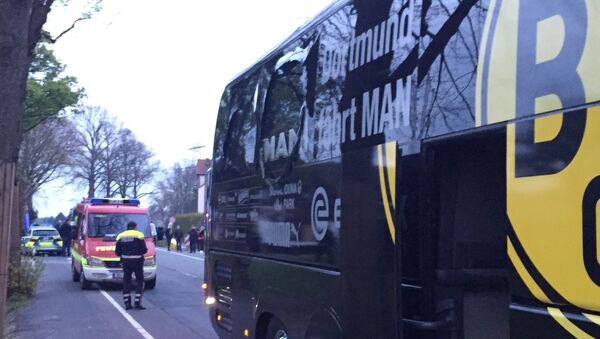 A window of the bus of Borussia Dortmund is damaged after an explosion before the Champions League quarterfinal soccer match against AS Monaco in Dortmund, western Germany, Tuesday, April 11, 2017. - Sputnik Moldova-România