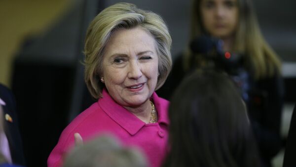 Democratic presidential candidate Hillary Clinton winks at a supporter after speaking at a campaign rally at the Iowa State Historical Museum in Des Moines, Iowa - Sputnik Moldova-România