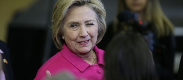 Democratic presidential candidate Hillary Clinton winks at a supporter after speaking at a campaign rally at the Iowa State Historical Museum in Des Moines, Iowa - Sputnik Moldova-România