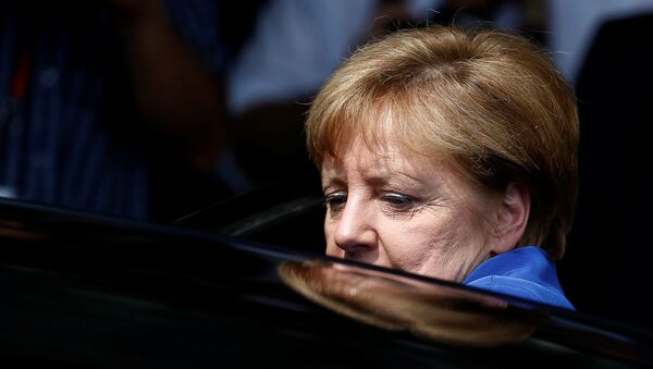 German Chancellor Angela Merkel leaves a news conference in Berlin, Germany (File) - Sputnik Moldova-România