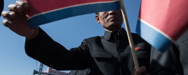 Церемония открытия нового жилого комплекса на улице Рёмён в Пхеньяне - Sputnik Moldova-România