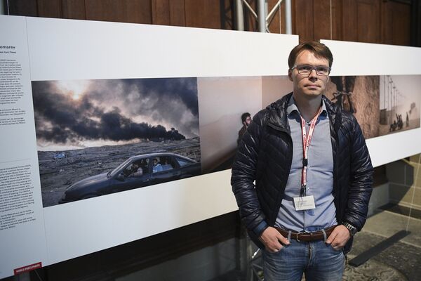 Выставка победителей World Press Photo в Амстердаме - Sputnik Молдова