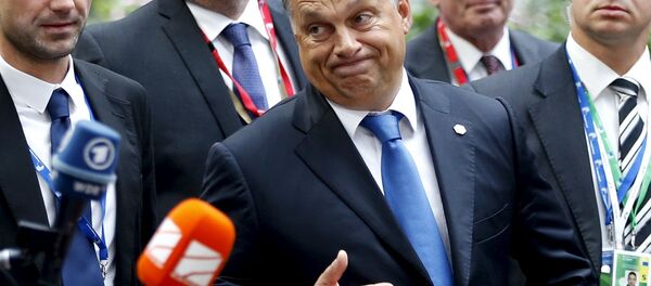 Hungary's Prime Minister Viktor Orban reacts as he arrives at a European Union leaders extraordinary summit on the migrant crisis, in Brussels, Belgium September 23, 2015. - Sputnik Moldova
