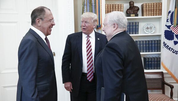 A handout photo made available by the Russian Foreign Ministry on May 10, 2017 shows US President Donald J. Trump (C) speaking with Russian Foreign Minister Sergei Lavrov (L) and Russian Ambassador to the U.S. Sergei Kislyak during a meeting at the White House in Washington, DC - Sputnik Moldova-România