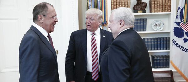 A handout photo made available by the Russian Foreign Ministry on May 10, 2017 shows US President Donald J. Trump (C) speaking with Russian Foreign Minister Sergei Lavrov (L) and Russian Ambassador to the U.S. Sergei Kislyak during a meeting at the White House in Washington, DC - Sputnik Moldova-România