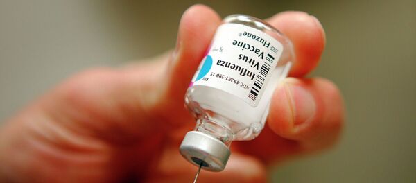 A nurse prepares an injection of the influenza vaccine at Massachusetts General Hospital A nurse prepares an injection of the influenza vaccine at Massachusetts General Hospital - Sputnik Moldova-România