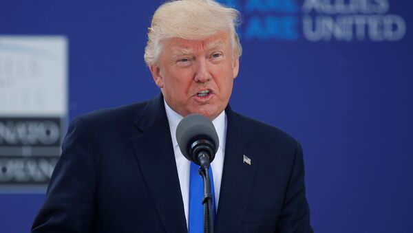 U.S. President Donald Trump speaks at the start of the NATO summit at their new headquarters in Brussels, Belgium - Sputnik Moldova-România
