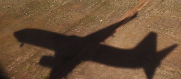 The shadow of a flying plane. (File) The shadow of a flying plane. (File) - Sputnik Молдова