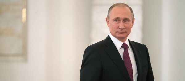Президент РФ Владимир Путин во время встречи в Кремле с паралимпийской сборной России по летним видам спорта - Sputnik Moldova