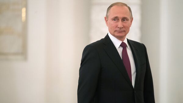 Президент РФ Владимир Путин во время встречи в Кремле с паралимпийской сборной России по летним видам спорта - Sputnik Moldova