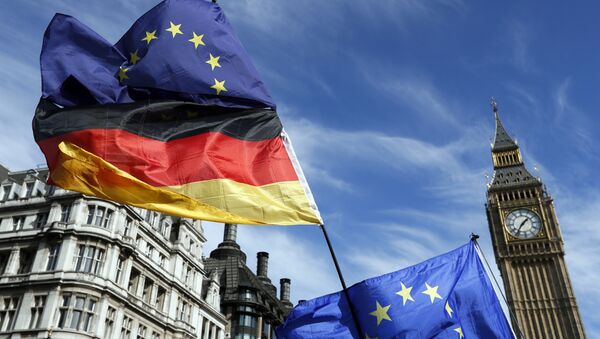 Anti Brexit campaigners carry a Germany flag and European flags outside Britain's parliament in London, Saturday March 25, 2017. - Sputnik Moldova-România