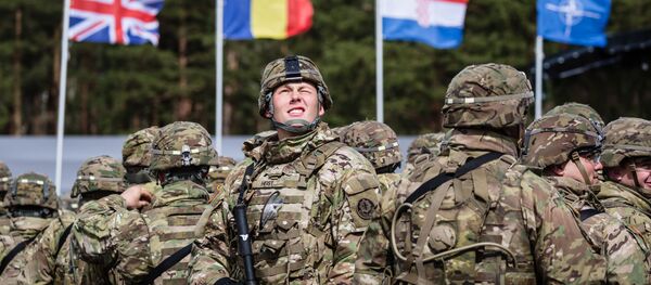 US soldiers are pictured prior the beginning of the official welcoming ceremony of NATO troops in Orzysz, Poland, on April 13, 2017. US soldiers are pictured prior the beginning of the official welcoming ceremony of NATO troops in Orzysz, Poland, on April 13, 2017. - Sputnik Moldova