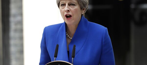 British Prime Minister Theresa May addresses the press in Downing street, London, Friday, June 9, 2017 following an audience with Britain's Queen Elizabeth II at Buckingham Palace where she asked to form a government. - Sputnik Moldova