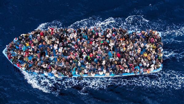 Una barca di migranti - Sputnik Moldova-România