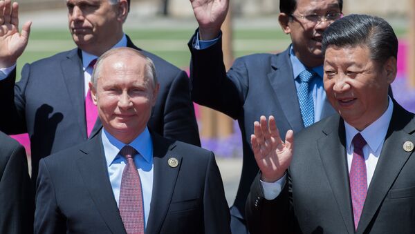 Президент РФ Владимир Путин и председатель КНР Си Цзиньпин, архивное фото - Sputnik Молдова