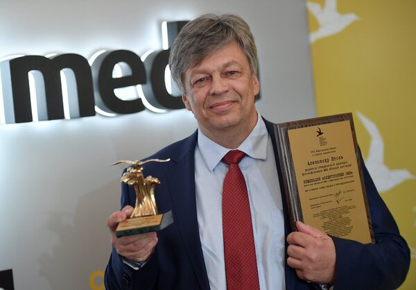 Директор объединенной дирекции фотоинформации МИА Россия сегодня Александр Штоль, получивший премию в номинации Электронные СМИ - Sputnik Молдова