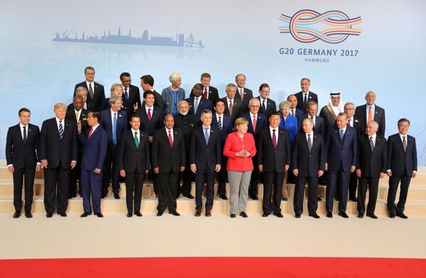 Президент РФ Владимир Путин на церемонии совместного фотографирования глав делегаций государств-участников Группы двадцати G20 в Гамбурге - Sputnik Молдова