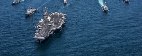 The Republic of Korea destroyers Sejong the Great and Yang Manchun, the Arleigh Burke-class guided-missile destroyers USS Wayne E. Meyer, USS Michael Murphy and USS Stethem, the Ticonderoga-class guided-missile cruiser USS Lake Champlain and the Nimitz-class aircraft carrier USS Carl Vinson transit the western Pacific Ocean on May 3, 2017. Picture taken on May 3, 2017 The Republic of Korea destroyers Sejong the Great and Yang Manchun, the Arleigh Burke-class guided-missile destroyers USS Wayne E. Meyer, USS Michael Murphy and USS Stethem, the Ticonderoga-class guided-missile cruiser USS Lake Champlain and the Nimitz-class aircraft carrier USS Carl Vinson transit the western Pacific Ocean on May 3, 2017. Picture taken on May 3, 2017 - Sputnik Moldova-România