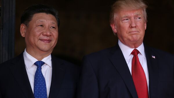 US President Donald Trump welcomes Chinese President Xi Jinping at Mar-a-Lago state in Palm Beach, Florida, US, April 6, 2017. - Sputnik Moldova-România