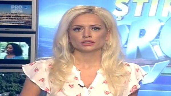Anișoara Loghin prezintă un buletin de știri, captură ecran Anișoara Loghin prezintă un buletin de știri, captură ecran - Sputnik Moldova-România