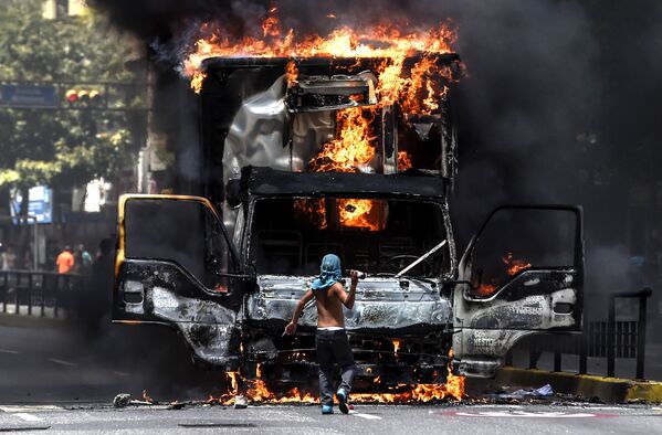 Протесты оппозиции в Каракасе, Венесуэла - Sputnik Молдова
