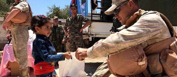 Российский центр по примирению враждующих сторон доставил гуманитарную помощь в сирийскую провинцию Кунейтра Российский центр по примирению враждующих сторон доставил гуманитарную помощь в сирийскую провинцию Кунейтра - Sputnik Молдова