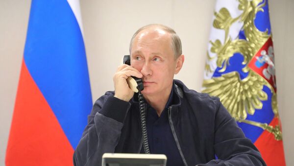 Vladimir Poutine lors d'un entretien téléphonique - Sputnik Moldova-România