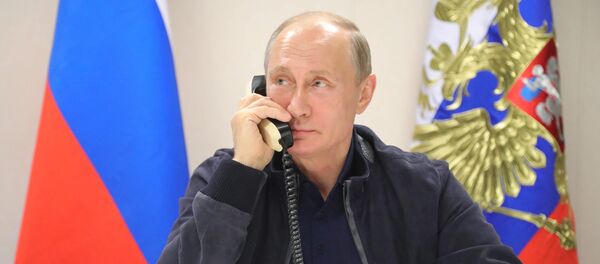 Vladimir Poutine lors d'un entretien téléphonique Vladimir Poutine lors d'un entretien téléphonique - Sputnik Moldova-România