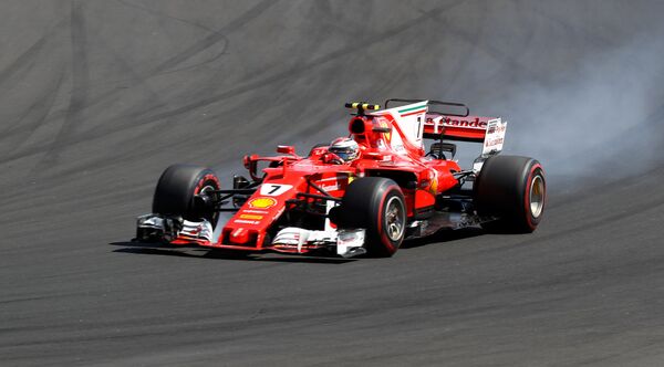 Гонщик Ferrari Кими Райкконен поднялся на вторую ступень подиума в Гран При Венгрии и стал Гонщиком дня по итогам голосования болельщиков - Sputnik Молдова