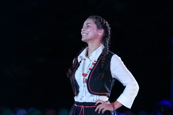 Кристина Коваленко исполнила зажигательную песню  Нелли Чобану - Hora din Moldova. - Sputnik Молдова