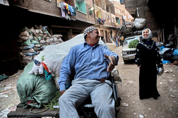 Жители района Маншият-Насир на окраине Каира, так называемого города мусорщиков. В этот район со всего города привозят мусор, который здесь сортируется, 2011 год - Sputnik Молдова