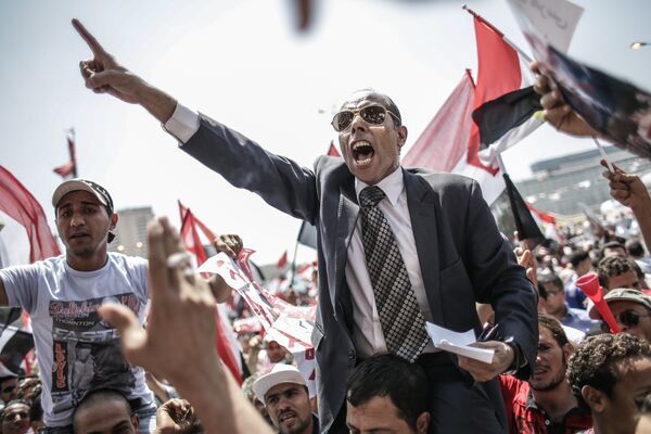 Противники президента Моххамеда Мурси на площади Тахрир, 2013 год - Sputnik Молдова