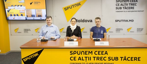 Евгений Паскарь, Татьяна Коптина и Андрей Хохлов Евгений Паскарь, Татьяна Коптина и Андрей Хохлов - Sputnik Молдова