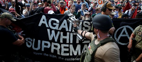 Members of white nationalists are met by a group of counter-protesters in Charlottesville, Virginia, U.S Members of white nationalists are met by a group of counter-protesters in Charlottesville, Virginia, U.S - Sputnik Moldova-România