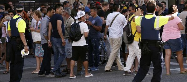 На месте наезда автомобиля на людей в Барселоне, Испания На месте наезда автомобиля на людей в Барселоне, Испания - Sputnik Молдова